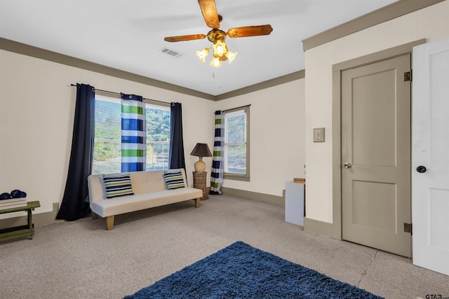 bedroom with light carpet and ceiling fan