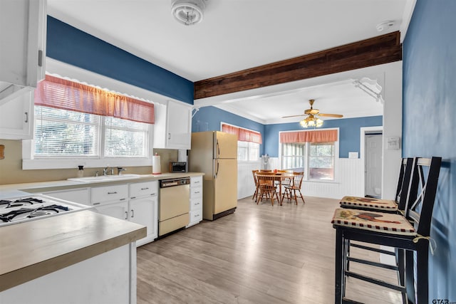 kitchen featuring dishwasher, white cabinets, white refrigerator, sink, and ceiling fan