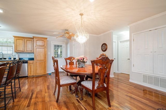 1831 Scarlet Oak Rd, Gilmer, TX 75645 - dining room with plenty of natural light, wood finished floors, visible vents, and crown molding