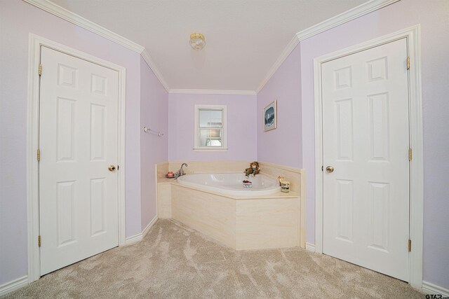 1831 Scarlet Oak Rd, Gilmer, TX 75645 - bathroom with baseboards, carpet floors, a bath, and crown molding