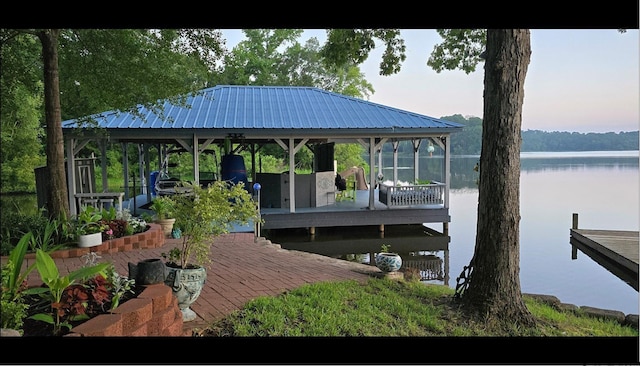 view of dock with a water view