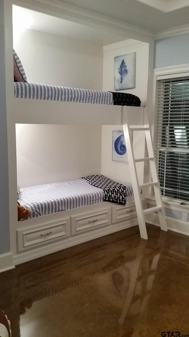 mudroom with crown molding and dark carpet