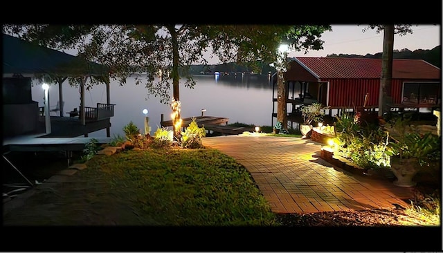 dock area featuring a water view