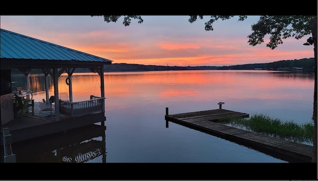 dock area featuring a water view