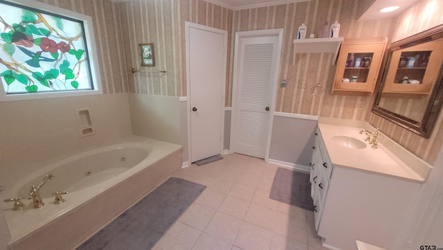 3802 Allendale Dr, Tyler, TX 75701 - bathroom with a tub with jets, vanity, tile patterned floors, wallpapered walls, and a closet