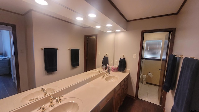 3802 Allendale Dr, Tyler, TX 75701 - full bath featuring crown molding, double vanity, recessed lighting, wood finished floors, and baseboards