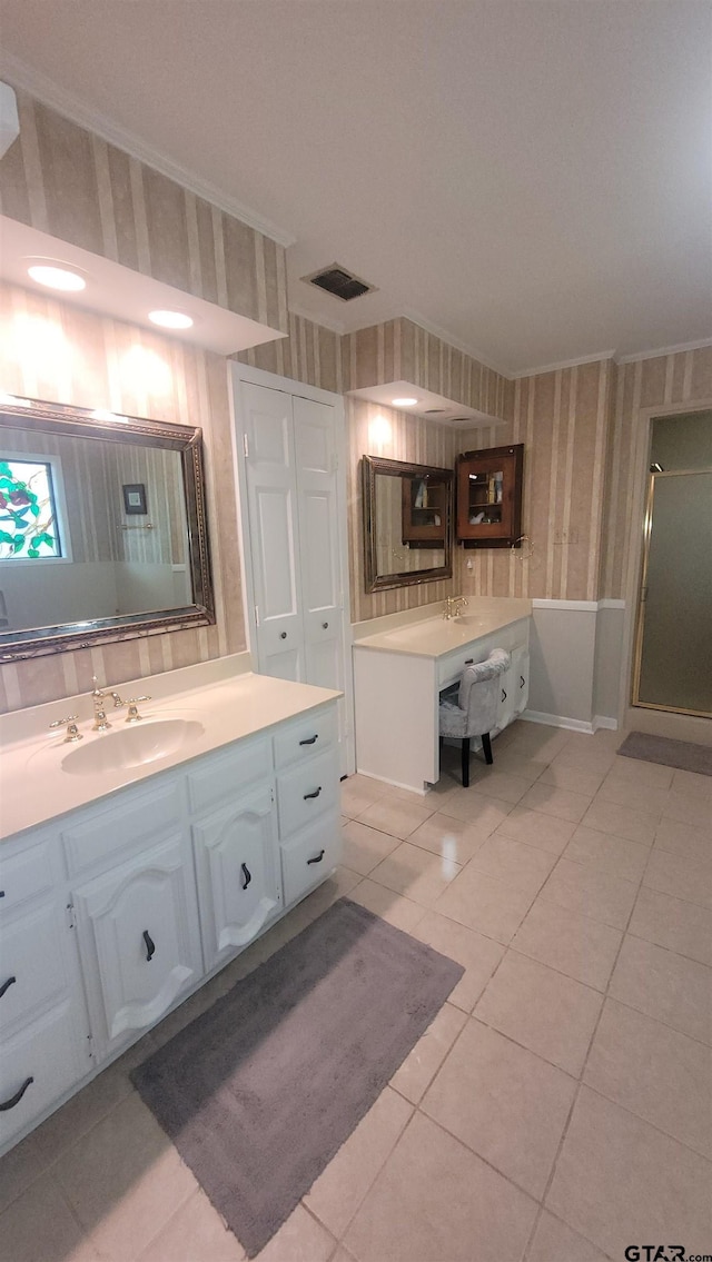 3802 Allendale Dr, Tyler, TX 75701 - bathroom with wallpapered walls, tile patterned floors, vanity, ornamental molding, and a shower stall