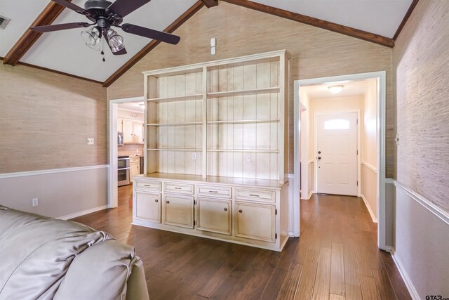 unfurnished living room with high vaulted ceiling, beamed ceiling, hardwood / wood-style flooring, and ceiling fan