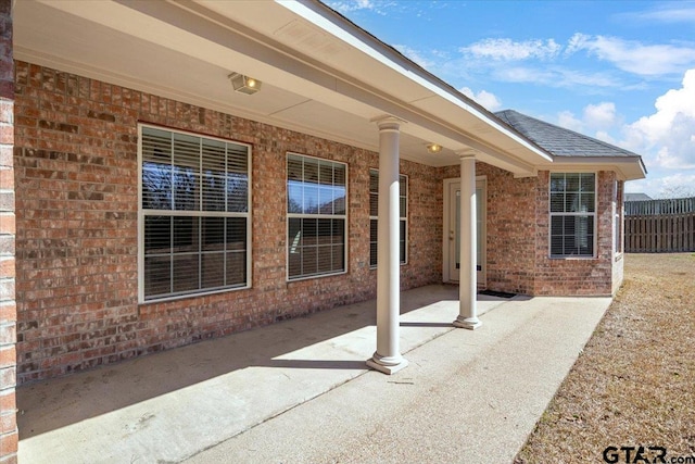 view of patio with fence