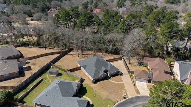 birds eye view of property with a residential view