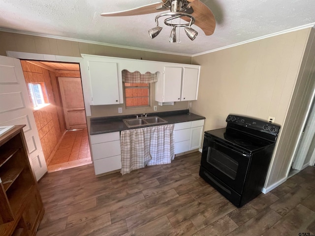 kitchen featuring sink, ceiling fan, white cabinets, black electric range, and dark wood-type flooring