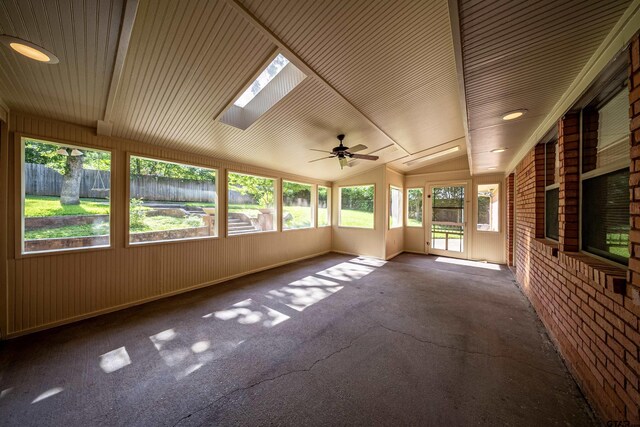 2929 Dinah Ln, Tyler, TX 75701 - unfurnished sunroom featuring plenty of natural light, ceiling fan, lofted ceiling, and a skylight