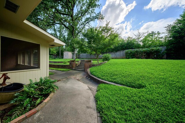 2929 Dinah Ln, Tyler, TX 75701 - view of yard featuring a storage shed