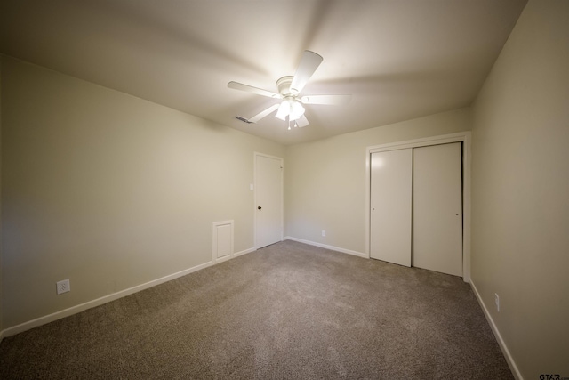 2929 Dinah Ln, Tyler, TX 75701 - unfurnished bedroom featuring carpet floors, a ceiling fan, and a closet