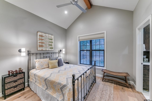 bedroom featuring beam ceiling, high vaulted ceiling, a ceiling fan, wood finished floors, and baseboards