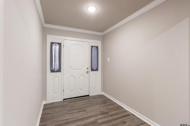 foyer featuring crown molding, baseboards, and dark wood-type flooring