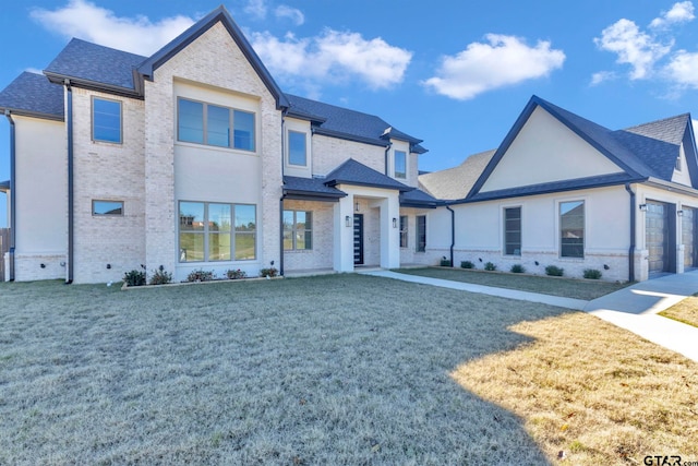 view of front of home with a front lawn