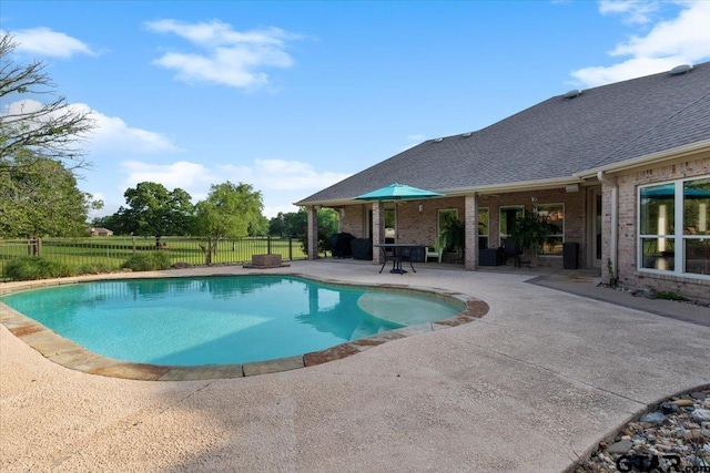 view of pool featuring a patio