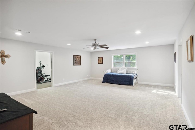 carpeted bedroom with ceiling fan