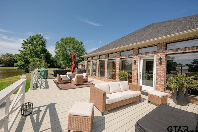 wooden deck with an outdoor hangout area