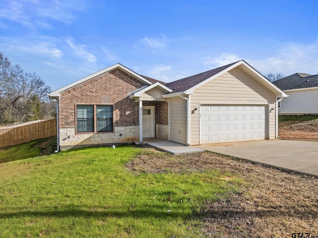 single story home featuring a front yard and a garage