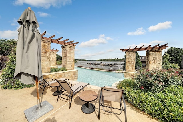 view of pool featuring a patio area