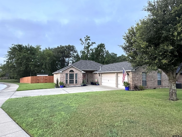 2509 Guinn Farms Rd, Tyler, TX 75707 - ranch-style home featuring brick siding, a garage, driveway, and a shingled roof