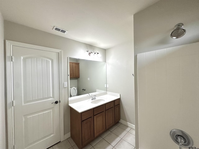 2509 Guinn Farms Rd, Tyler, TX 75707 - bathroom with tile patterned floors and vanity