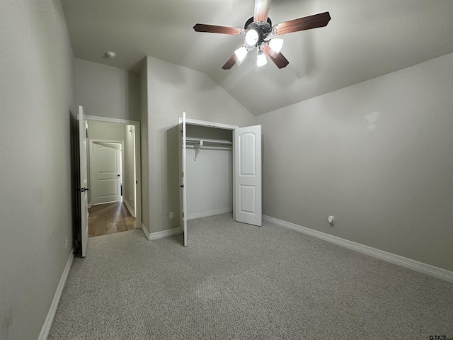 2509 Guinn Farms Rd, Tyler, TX 75707 - unfurnished bedroom featuring light carpet, vaulted ceiling, a ceiling fan, and a closet