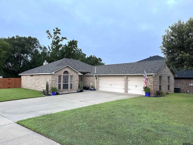 2509 Guinn Farms Rd, Tyler, TX 75707 - ranch-style home featuring brick siding, driveway, a garage, and roof with shingles