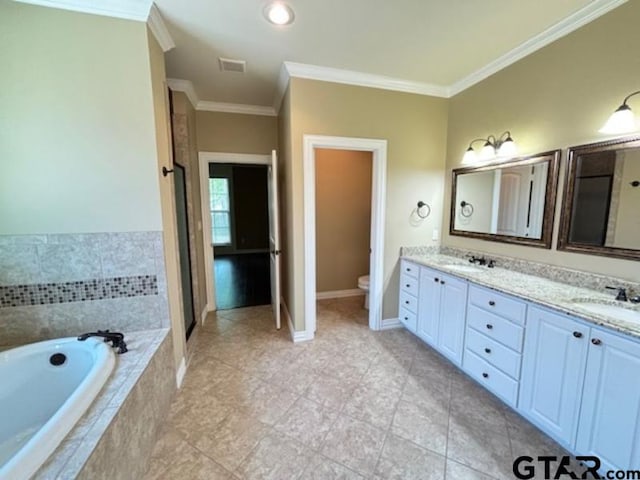 3673 Southwood Dr, Tyler, TX 75707 - full bath with crown molding, a sink, toilet, visible vents, and a bath