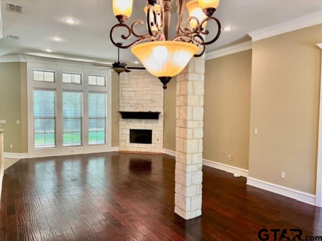 3673 Southwood Dr, Tyler, TX 75707 - unfurnished living room featuring visible vents, ornamental molding, baseboards, a stone fireplace, and hardwood / wood-style flooring
