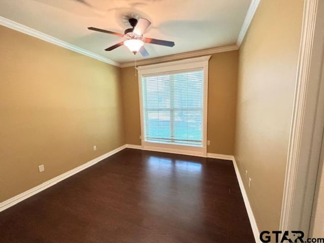 3673 Southwood Dr, Tyler, TX 75707 - spare room featuring baseboards, a ceiling fan, crown molding, and dark wood-style floors
