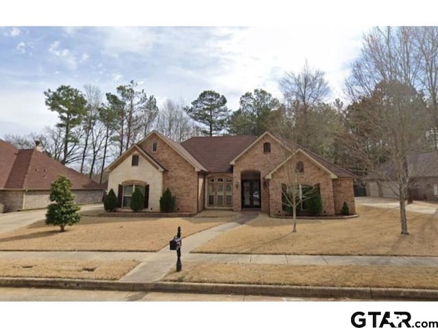 3673 Southwood Dr, Tyler, TX 75707 - view of front of house with brick siding