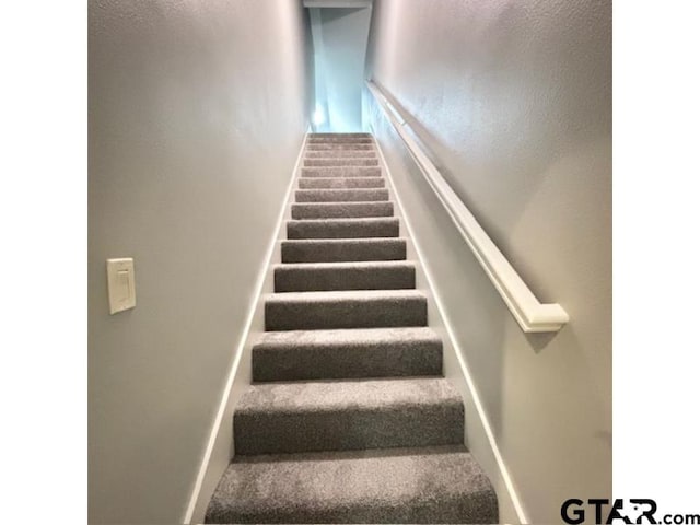 3673 Southwood Dr, Tyler, TX 75707 - staircase with baseboards