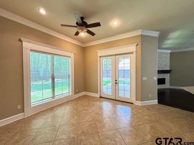 3673 Southwood Dr, Tyler, TX 75707 - doorway to outside featuring french doors, tile patterned floors, ornamental molding, and a ceiling fan