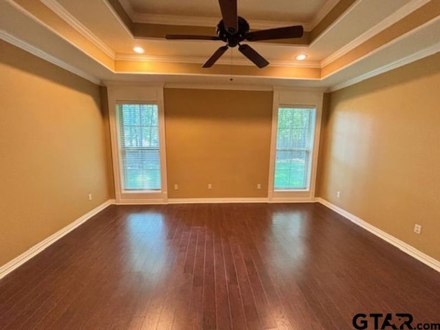 3673 Southwood Dr, Tyler, TX 75707 - unfurnished room with crown molding, plenty of natural light, and dark wood-style flooring