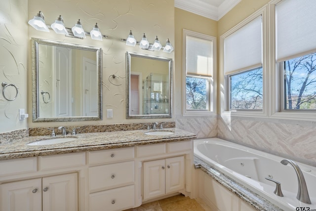 bathroom with tile patterned floors, vanity, ornamental molding, and tiled bath