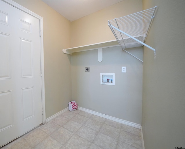 clothes washing area with washer hookup and electric dryer hookup