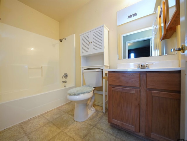 full bathroom featuring vanity, tile patterned flooring, toilet, and bathtub / shower combination