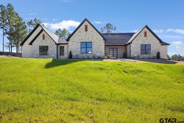 view of front of home with a front yard