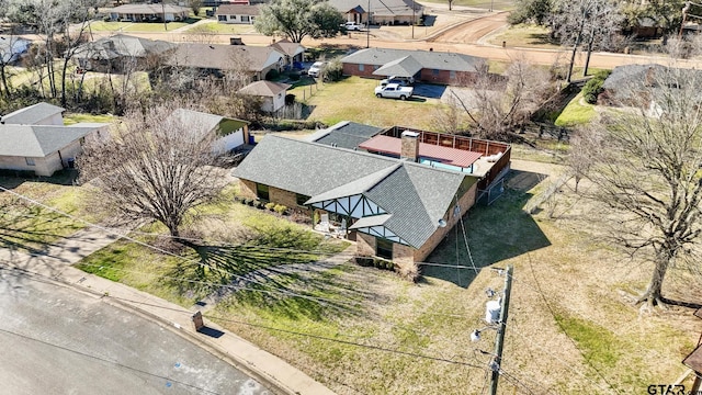 drone / aerial view with a residential view