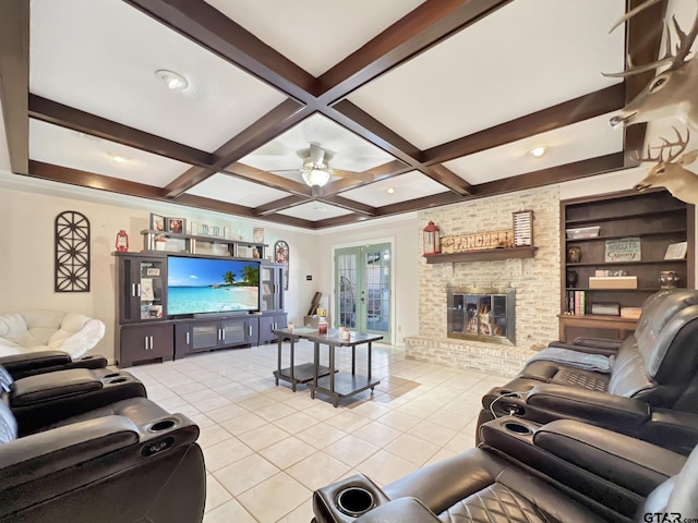 living room with tile patterned flooring, a brick fireplace, coffered ceiling, and beamed ceiling