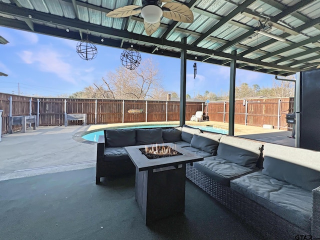 view of patio with a fenced backyard, a ceiling fan, a fenced in pool, and an outdoor living space with a fire pit