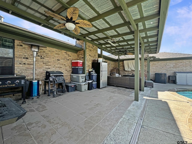 view of patio with a fenced in pool and an outdoor living space