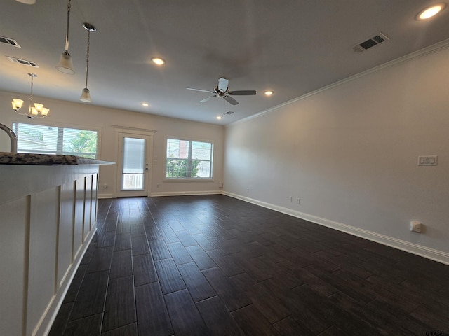 823 Lindsey Ln, Whitehouse, TX 75791 - unfurnished living room with wood finish floors, a ceiling fan, recessed lighting, a chandelier, and ornamental molding