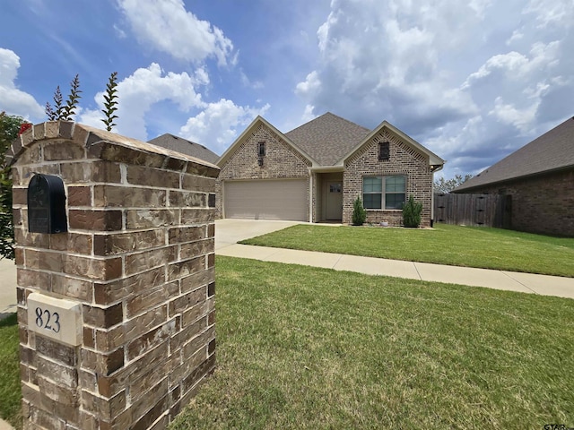 823 Lindsey Ln, Whitehouse, TX 75791 - view of front of home featuring brick siding, driveway, a garage, and a shingled roof