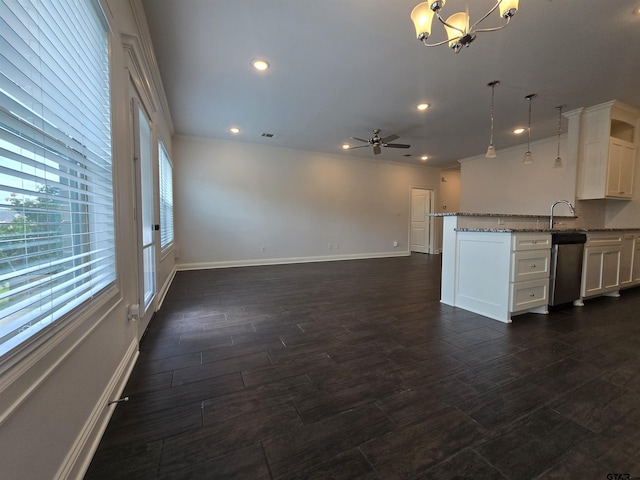 823 Lindsey Ln, Whitehouse, TX 75791 - kitchen with dishwasher, light stone countertops, pendant lighting, a ceiling fan, and dark wood-type flooring