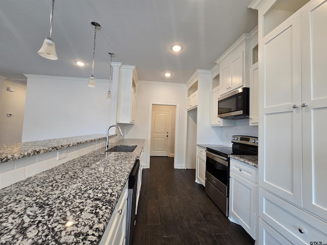 823 Lindsey Ln, Whitehouse, TX 75791 - kitchen featuring appliances with stainless steel finishes, crown molding, dark stone countertops, recessed lighting, and white cabinetry