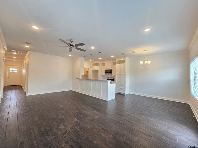 823 Lindsey Ln, Whitehouse, TX 75791 - unfurnished living room featuring a chandelier, ornamental molding, recessed lighting, ceiling fan, and dark wood-style flooring